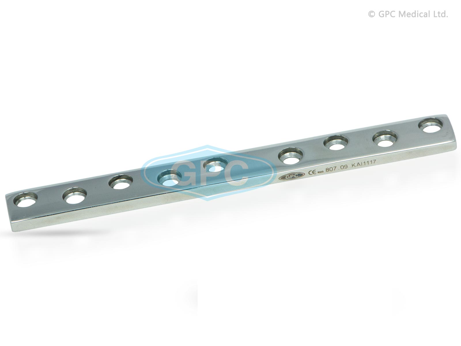 Large plaque à trous ronds